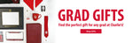 Flat lay image of diploma frame, red graduation cap with white tassel, watch, red tie with SD Paw logo, red padfolio, red mug, alumni license plate frame and graphic to the right that says, 'GRAD GIFTS Find the perfect gift for any grad at Charlie's! Shop Gifts.'