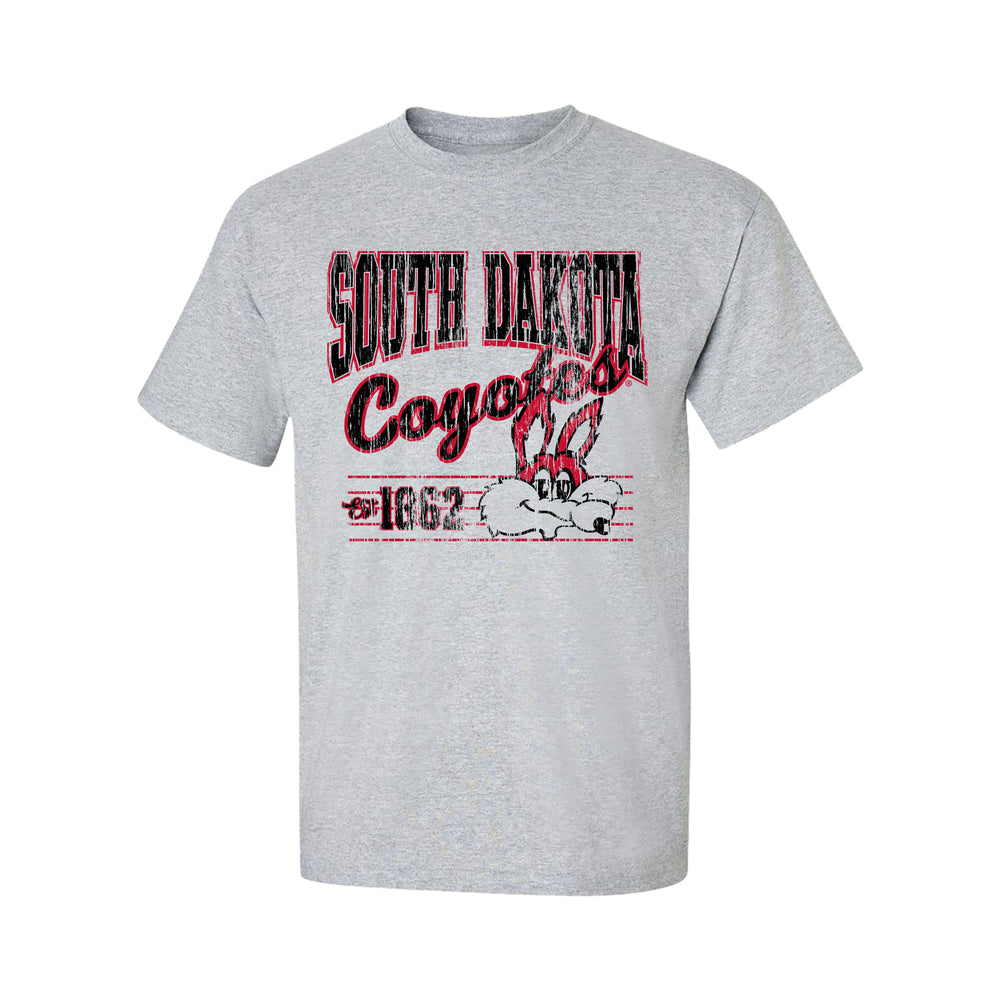 Gray tee with distressed screenprint in black and red text 'SOUTH DAKOTA Coyotes est. 1862' and a vintage Charlie Coyote face.