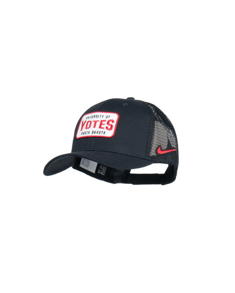 Black Nike mesh trucker hat with white patch on front that says 'UNIVERSITY OF SOUTH DAKOTA YOTES'