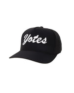 Black hat with white puff embroidered 'Yotes' across front. 