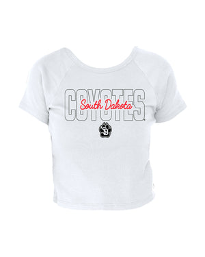 White baby tee with 'COYOTES South Dakota' across chest.