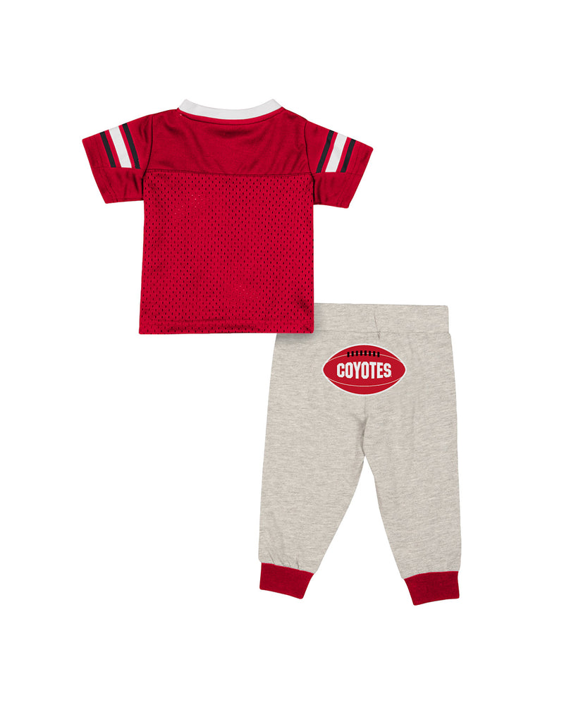 Back of infant jersey set. Pants have red football on bottom area that says, 'COYOTES.'