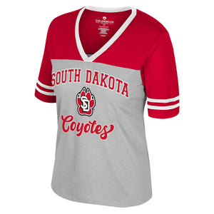 Red and gray top with 'South Dakota Coyotes' text and white stripes on the partial sleeves.