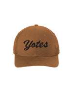 Carhartt brown snapback hat with black 'Yotes' script across front. 