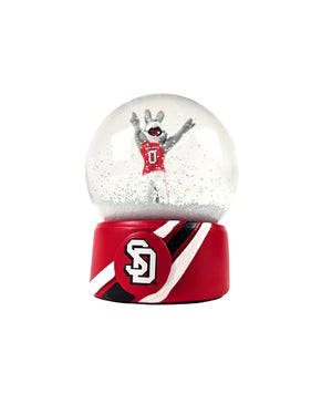 Snow Globe with snow falling featuring Charlie Coyote holding up 1 paw and pointing with the other while wearing a red a football jersey. The base is red white a white and black stripe diagonal behind the SD logo.