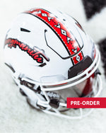Mockup of white mini football helmet with with word 'Sungmanitu' on the side and a red stripe with Native American symbols on the top. 