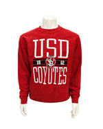 Red Women's Corded crew with large print across entire front in red and back, 'USD 1862 COYOTES.'