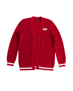 Red button up cardigan with white embroidered small, 'USD,' on upper left chest and white stripe along sleeve and bottom hem cuff.