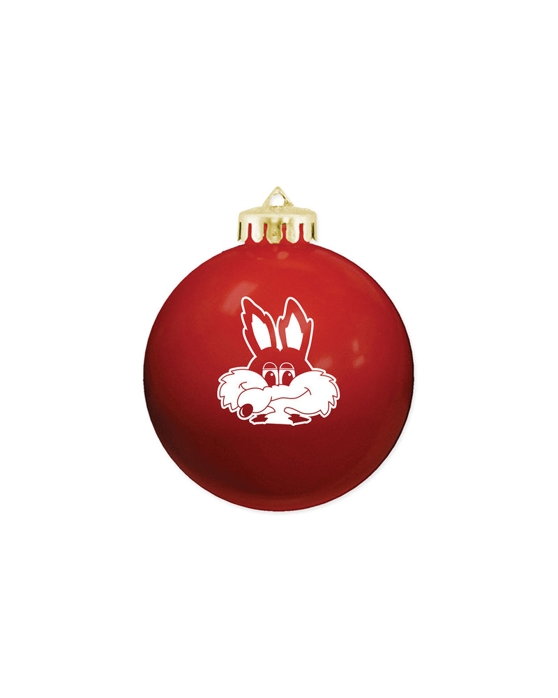 Red glass ball ornament with white vintage Charlie face.