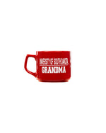 Red mug with white University of South Dakota Grandma