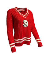 Red v-neck sweater with a white and black chenille 'SD' logo on chest and white stripes on cuffs.