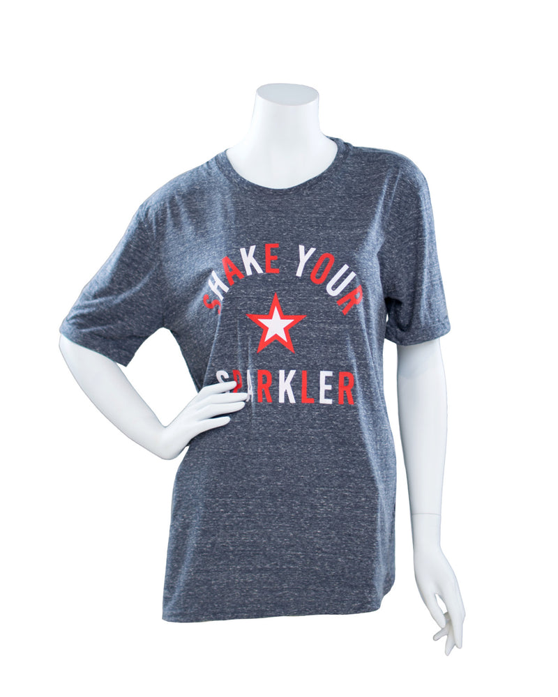 Heathered navy tee with red and white text that says 'SHAKE YOUR SPARKLER.'