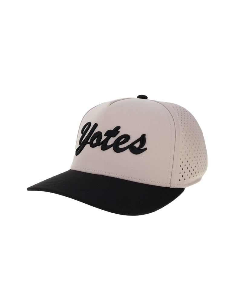 Beige and black cap with 'Yotes' script in black embroidery across front.