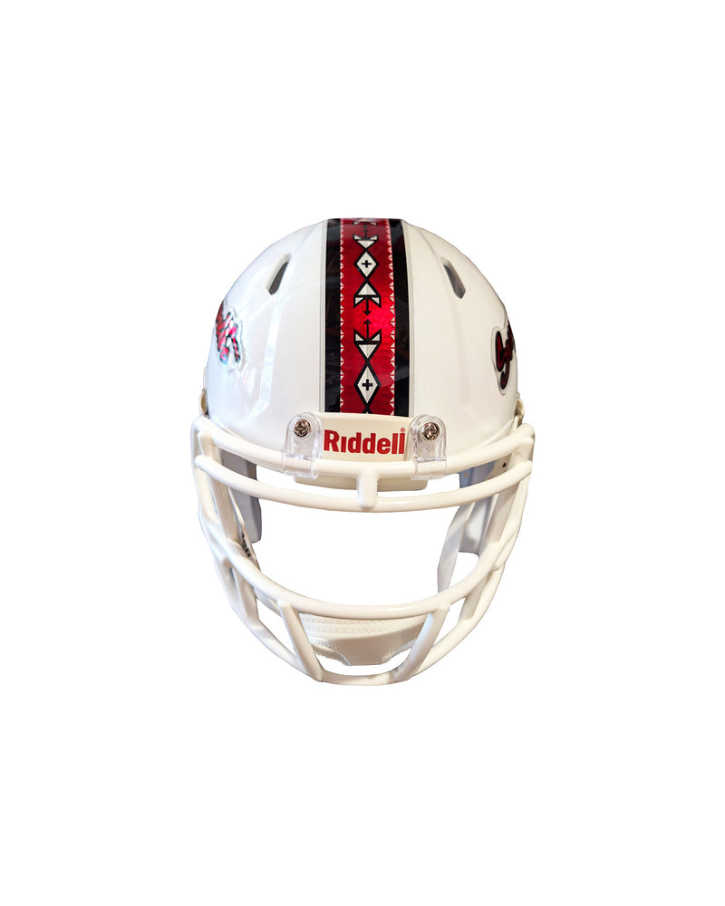 Front view of white mini football helmet showing red stripe with Native American symbols on the top. 