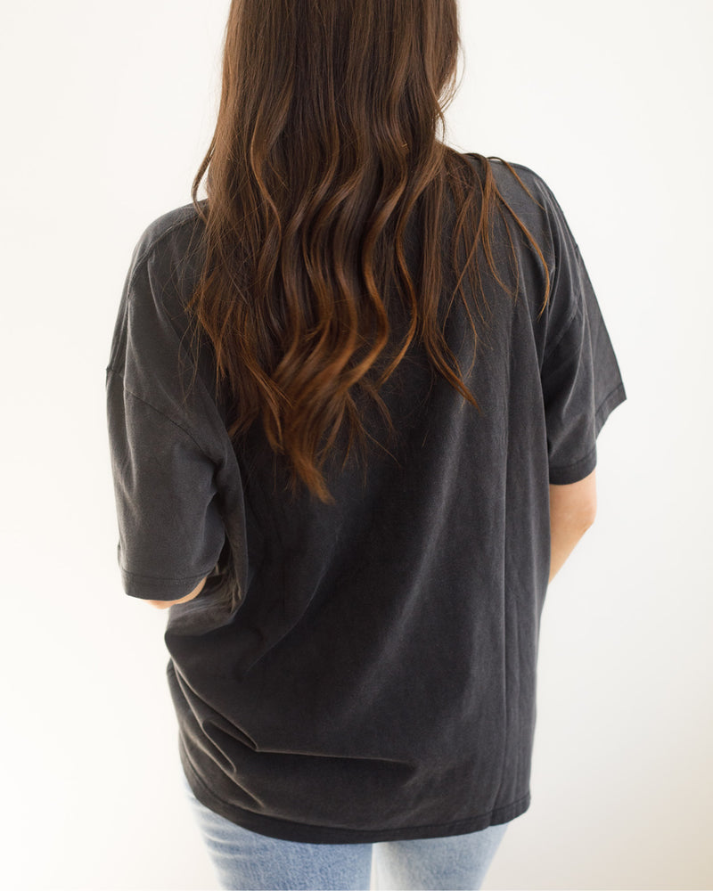 Blank back view of the black oversized tee.