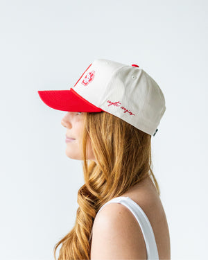 Other side view of hat showing a small script embroidered 'coyote crazies.'