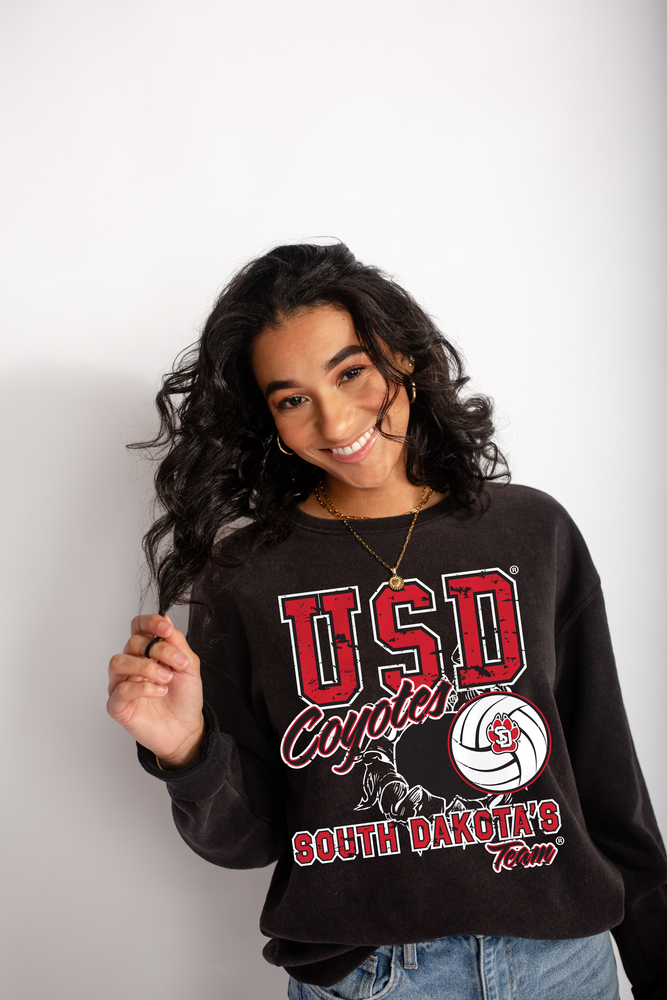 Black unisex crew with words, 'USD Coyotes SOUTH DAKOTA's Team' in white and red with a volleyball graphic