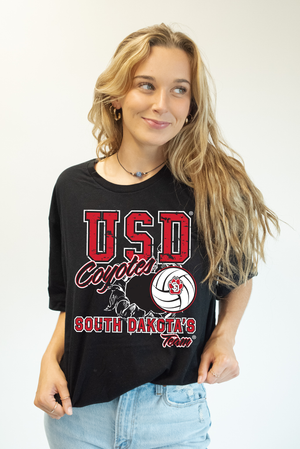 Black unisex tee with words, 'USD Coyotes SOUTH DAKOTA's Team' in white and red with a volleyball graphic
