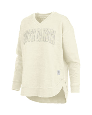 
                
                    Load image into Gallery viewer, White long sleeve vneck with  appliqué that says, &amp;#39; SOUTH DAKOTA&amp;#39;
                
            
