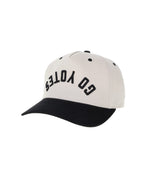 Beige and black cap with upside down embroidered 'GO YOTES.' 