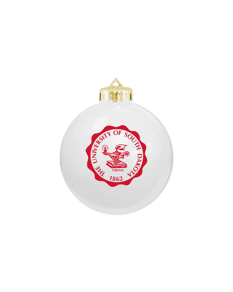 White glass ornament with red University of South Dakota seal imprint.