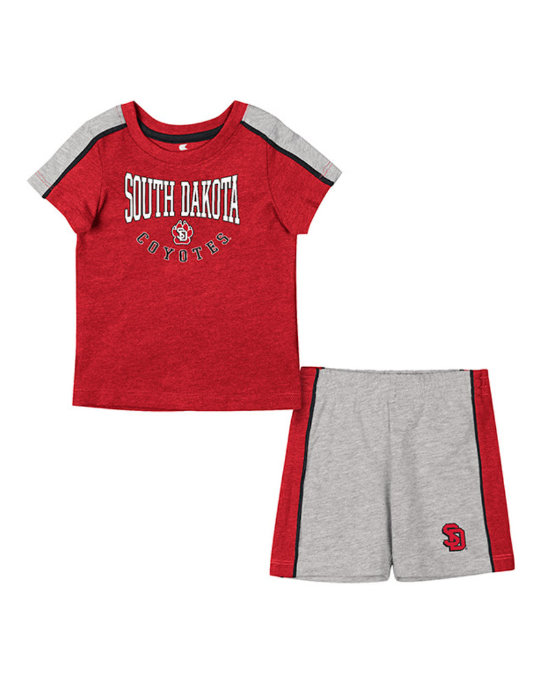 Red and gray tee that reads South Dakota Coyotes across the chest with the SD Paw and matching gray and red shorts with the SD logo on one leg