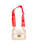 Clear purse with gold buckle and gold studded accents and red bag strap with Go Yotes on it