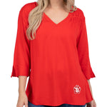 Red blouse with SD paw lower right 