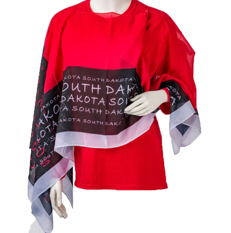 Red scarf with black strip and white South Dakota lettering