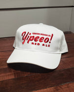White hat with red Yipeeo embroidery 