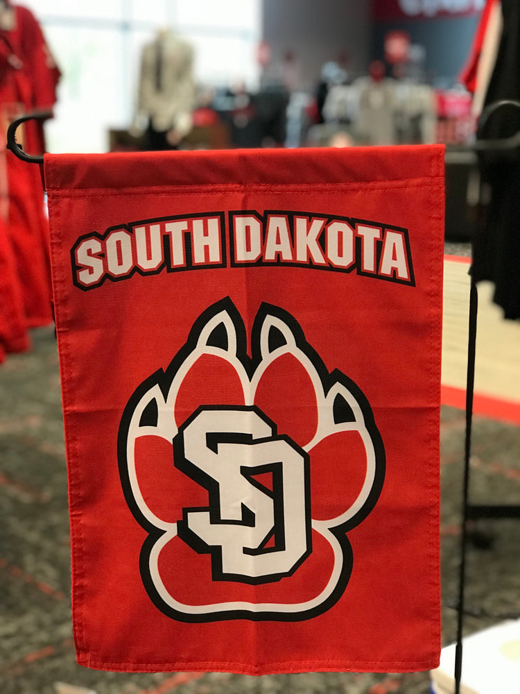 Red flag with SD paw and white South Dakota lettering